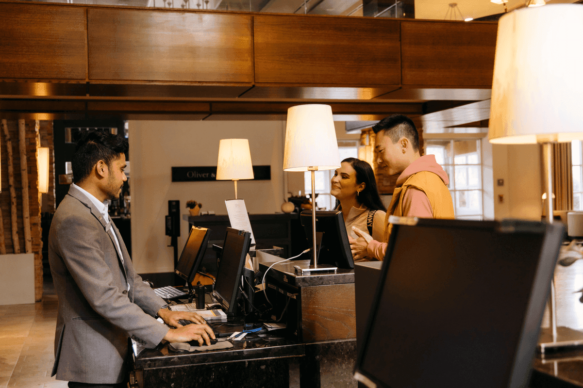 Hospitality staff providing service to guests.